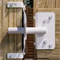 How to adjust the tension of a wood gate lock?